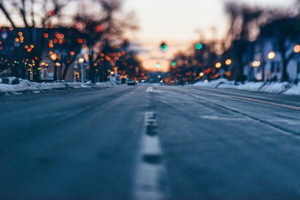 The roadway of the city street in lights