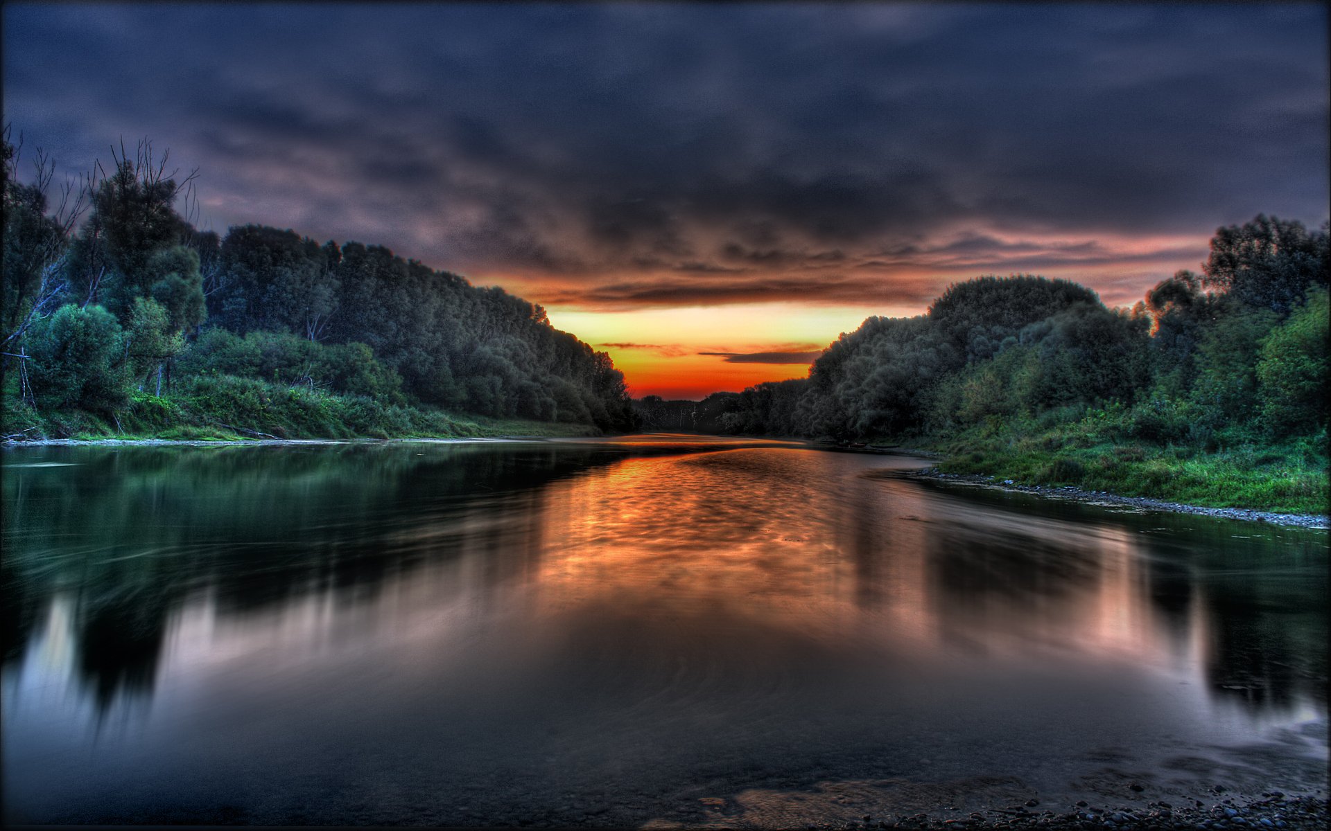 puesta de sol entre dos orillas y tal vez el amanecer