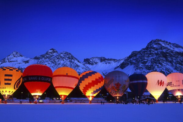 Big balloons in winter in Switzerland