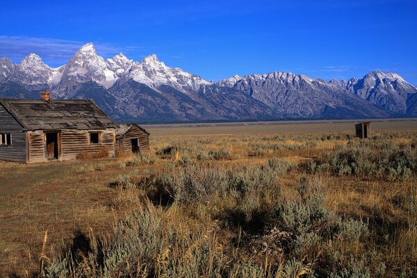 A lonely dilapidated house on a cliff