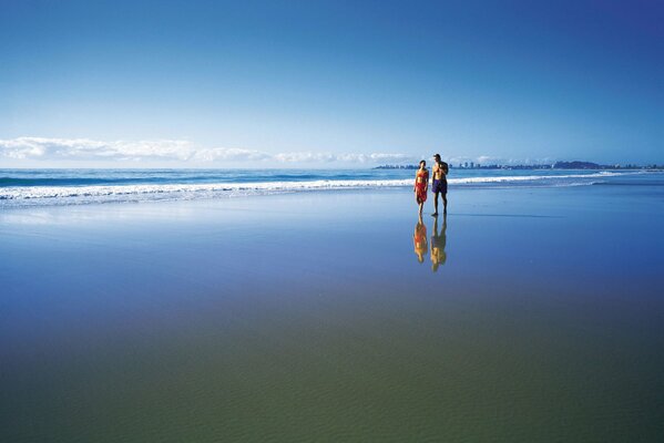 Couple s walk on the beach