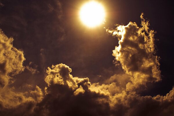 Golden clouds and an ominous full moon