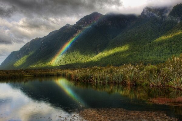 Seven-colored rainbow after heavy rain