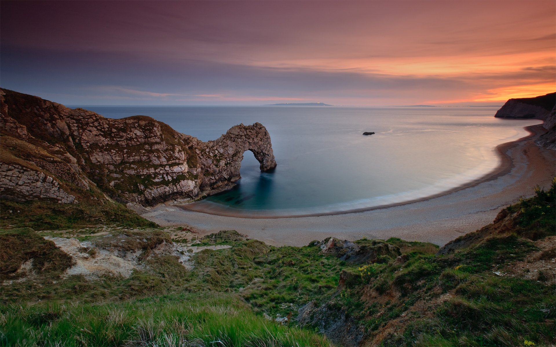 beach rock england sea sky sunset water