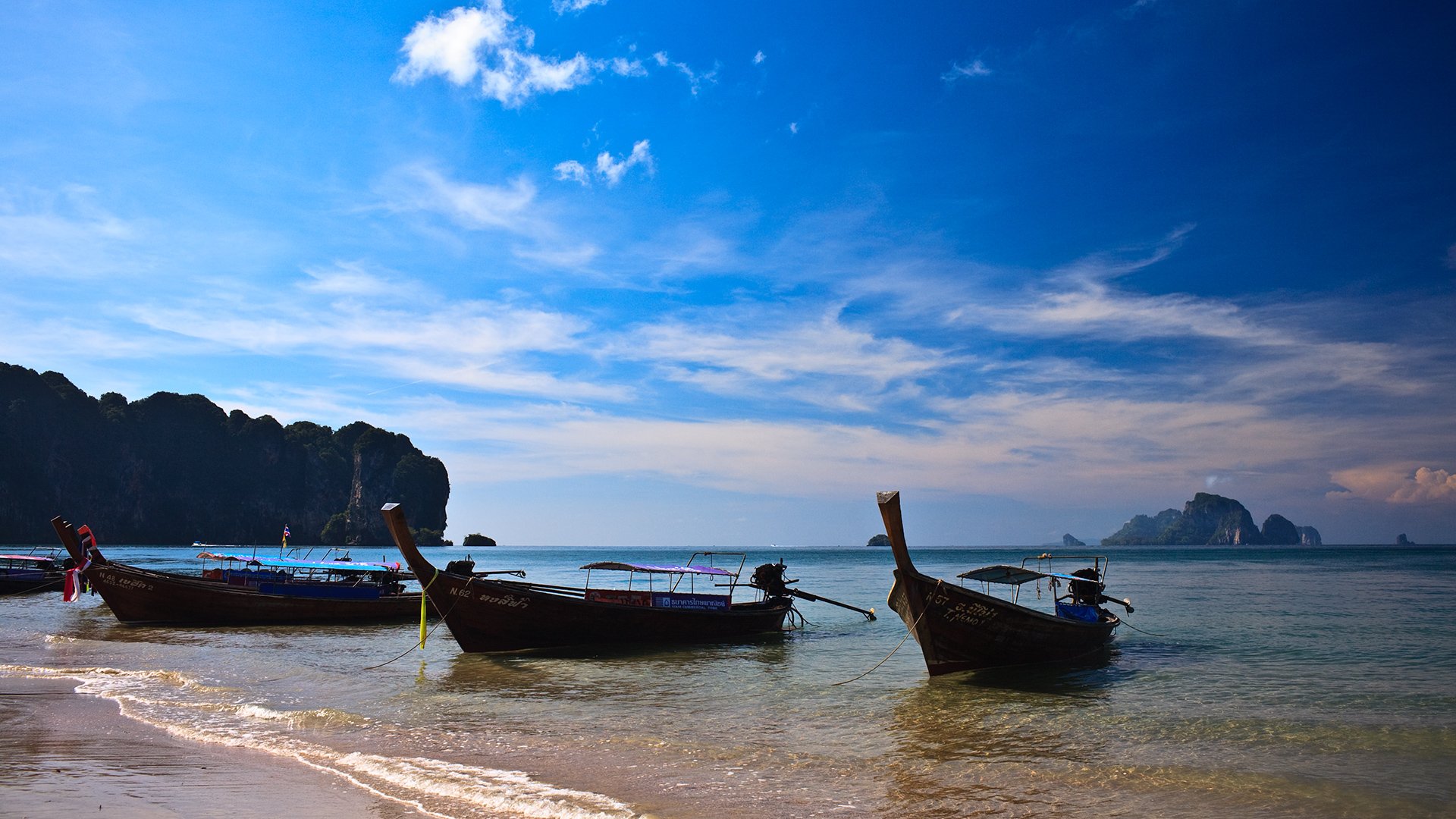 tailandia longboat sol mar montañas