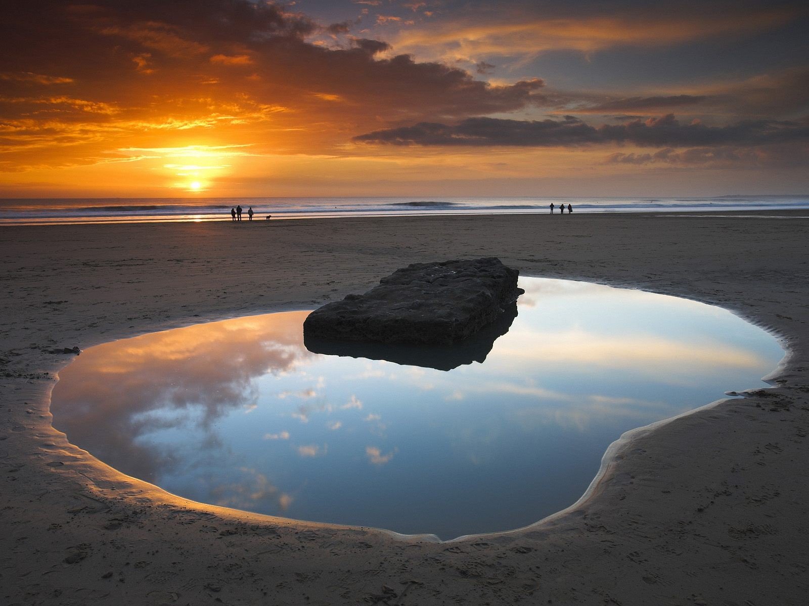 costa puesta de sol agua