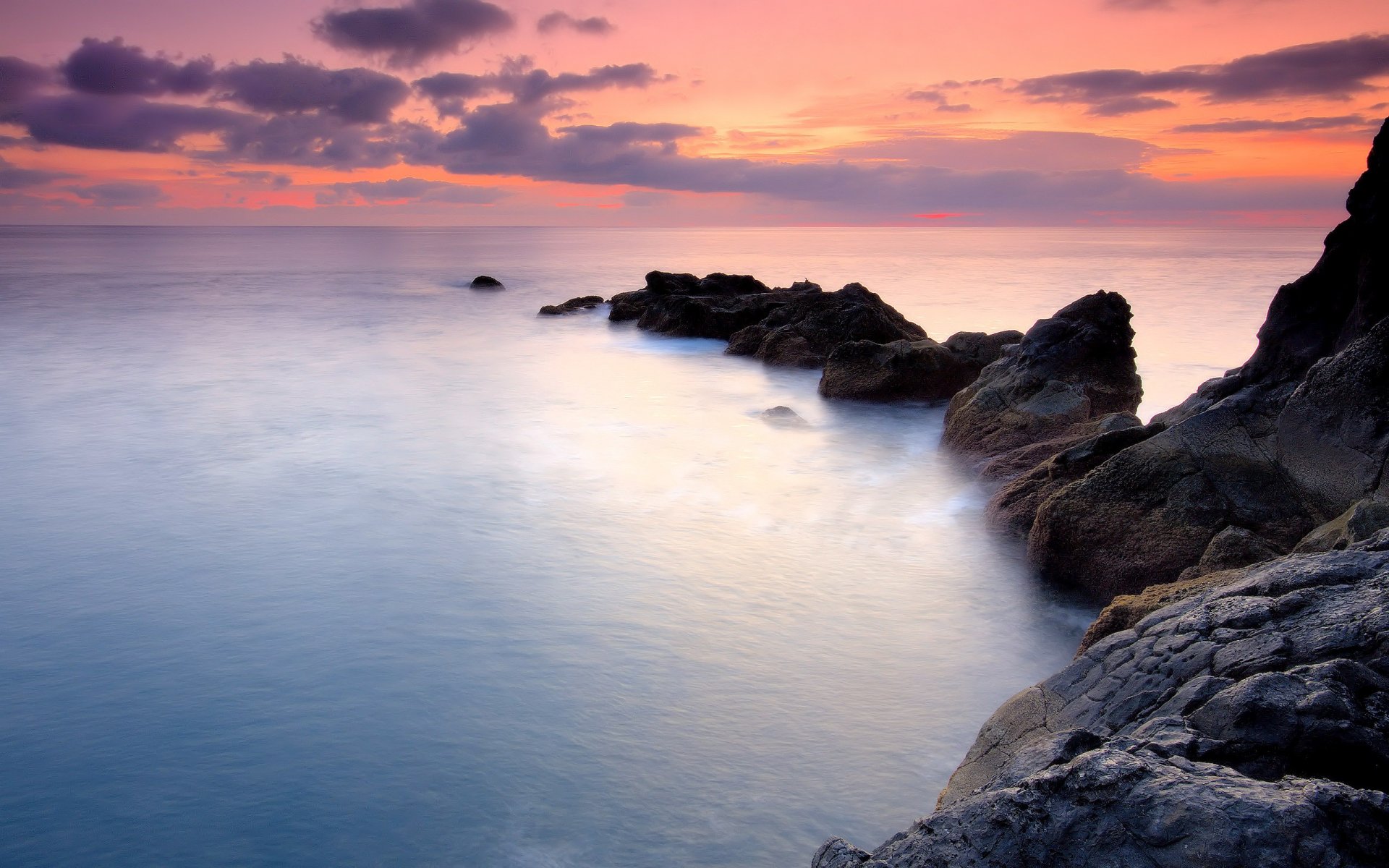 ocean rock sky water sunset