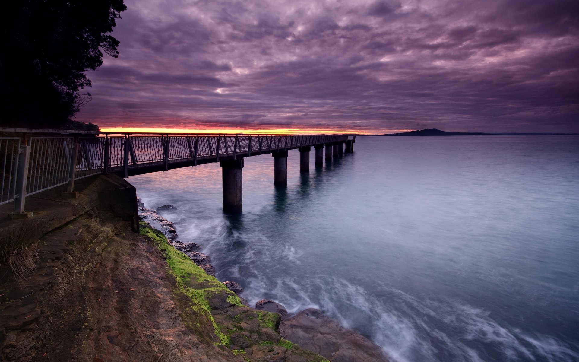 clouds water pier sunset