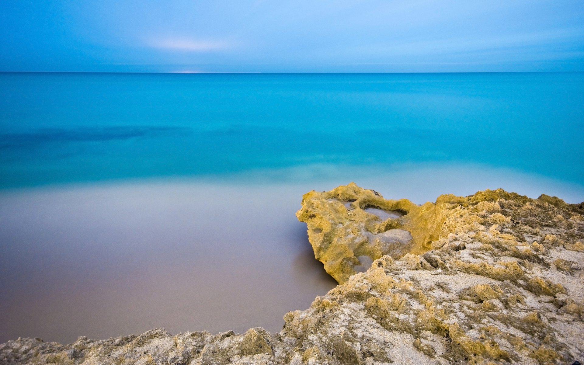 playa rocas mar cielo mañana agua