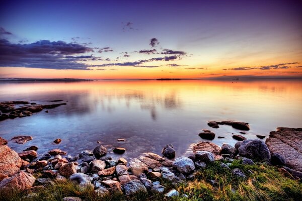 Sunset lake with sky reflection