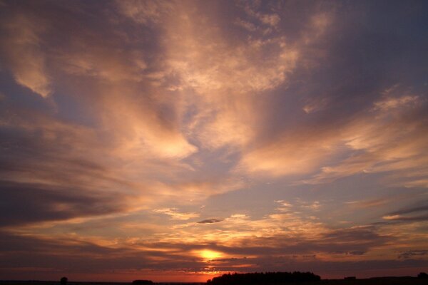 Sunrise over the sky and clouds