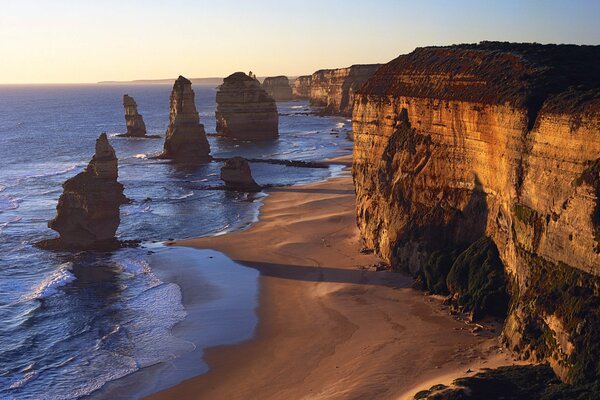 Harsh nature: cliff, rocks, sea