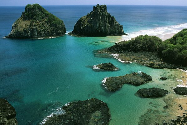 Rocks in the sea. the blue sea. clear sea