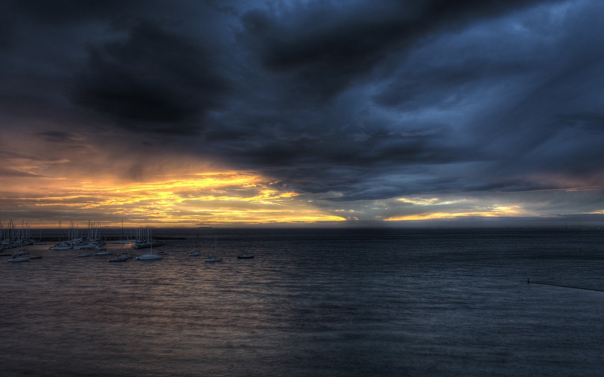 nuvole mare barche oscurità