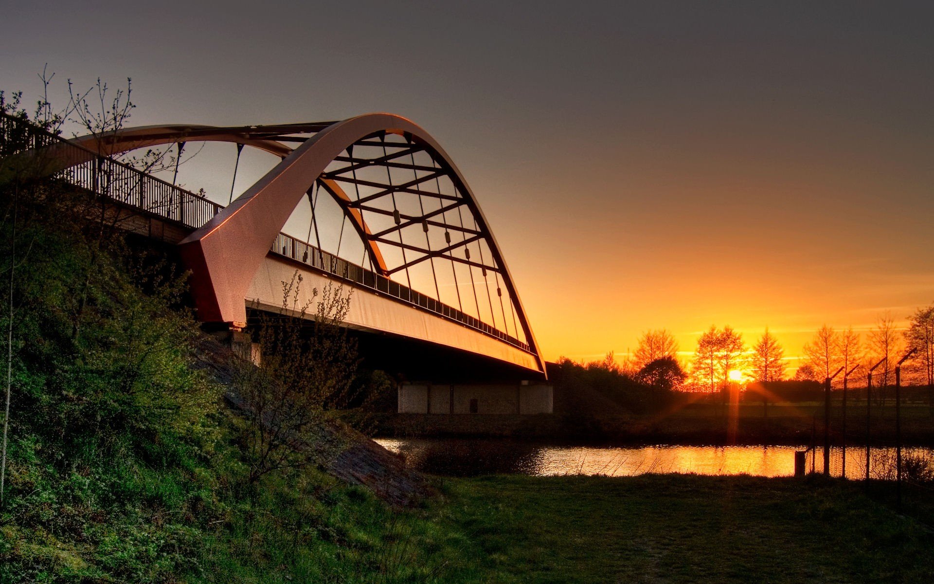 puente sol río