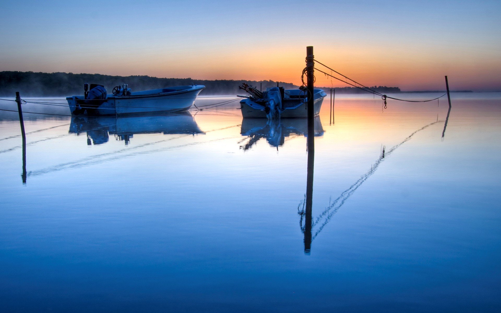 boat blue water fog