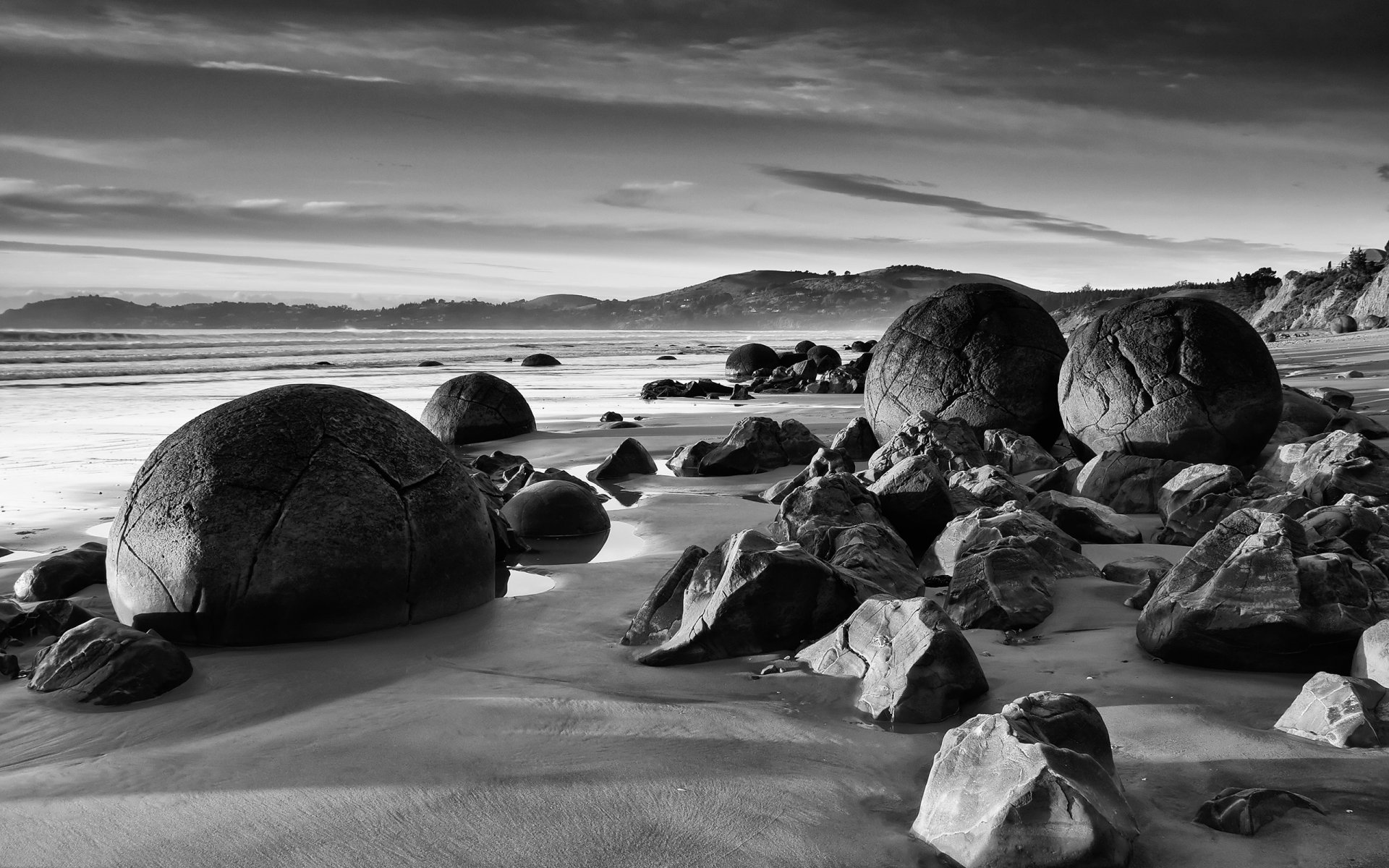 black and white round stones beach