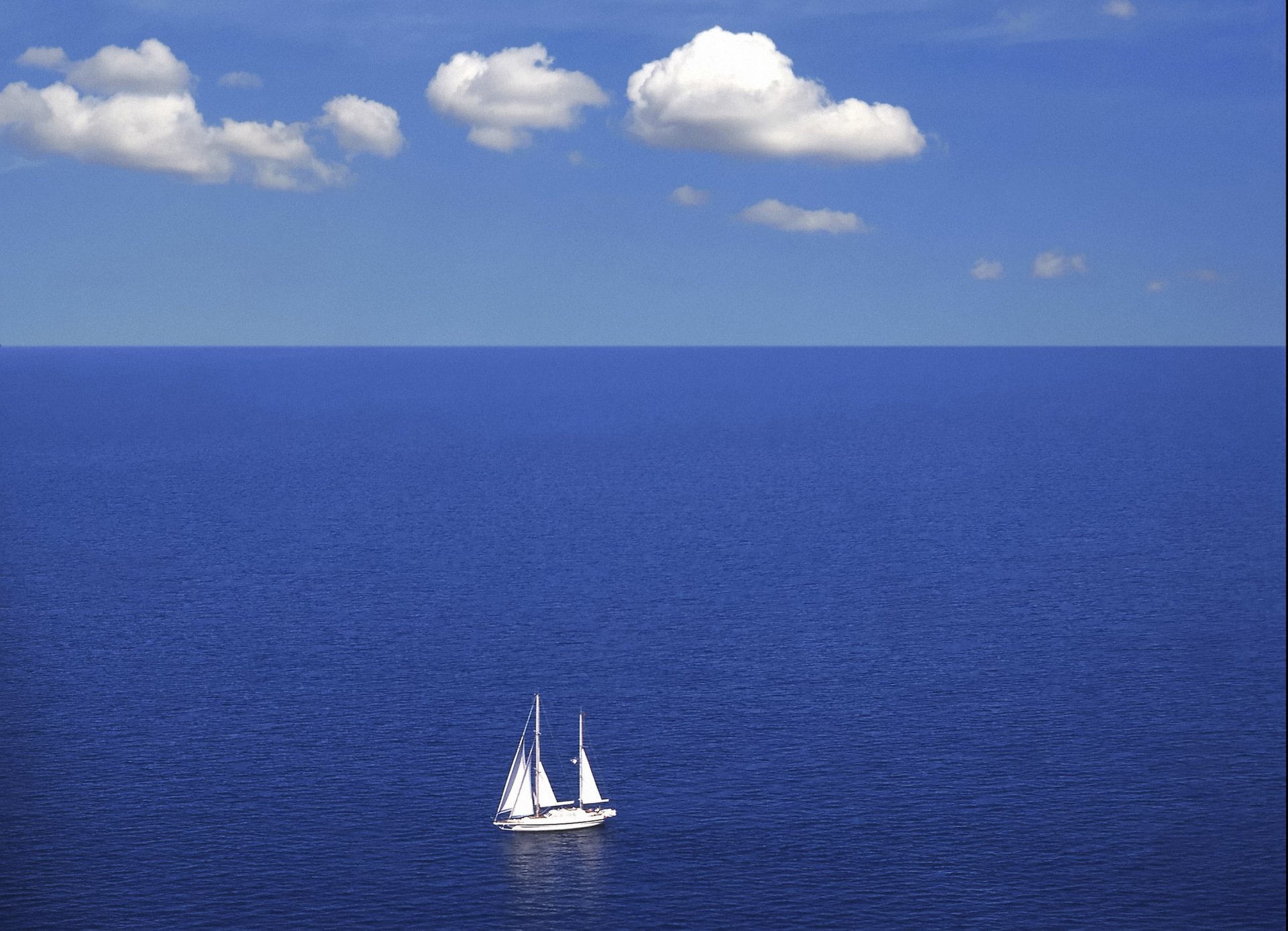 yacht sea clouds horizon blue
