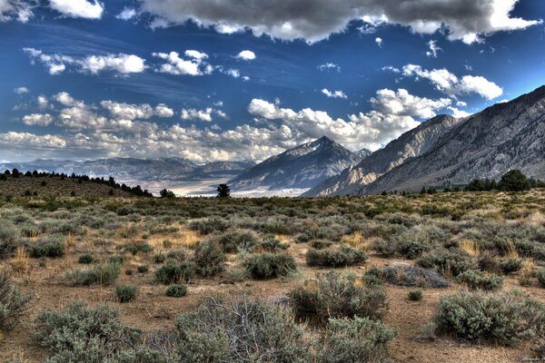 Clouds on the background of mountains