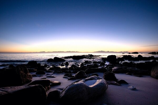 Stone beach at sunrise