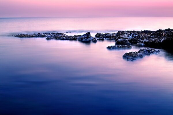 Oceano al tramonto all orizzonte