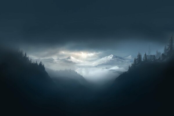 Snowy mountain peaks in the fog