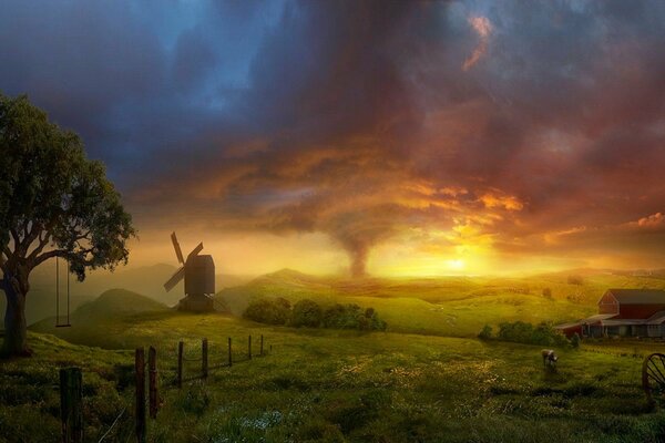 Tornado en un campo cerca de un antiguo molino