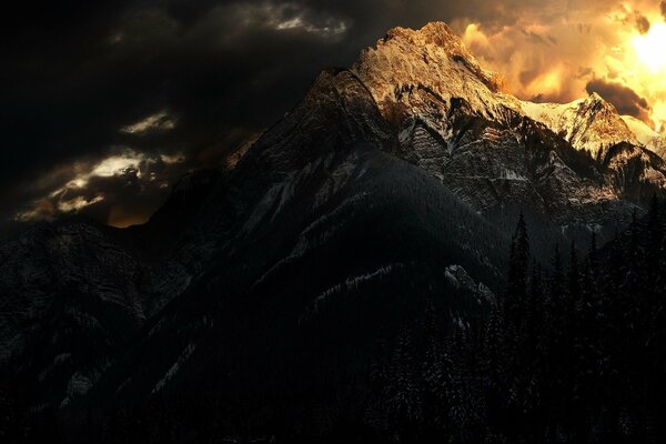 Dark mountains, sunlight