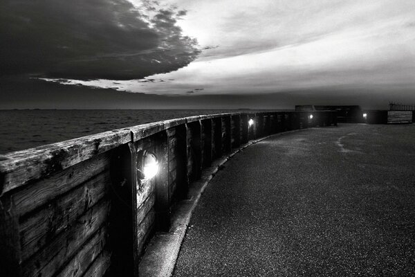 Black and white photo of the embankment before the rain