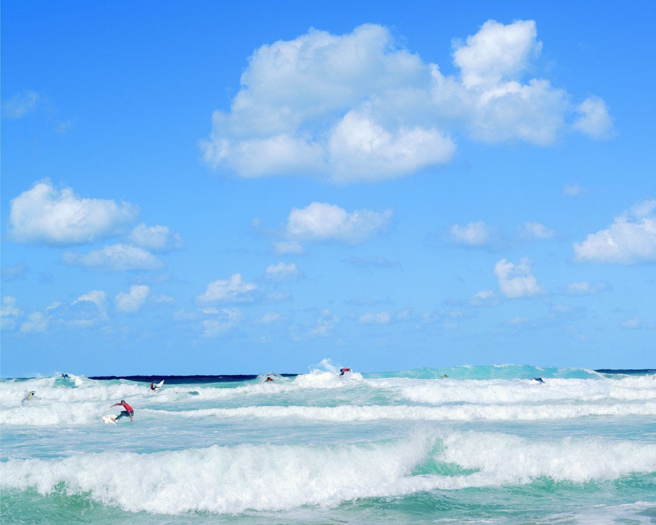 mar olas nubes surfista