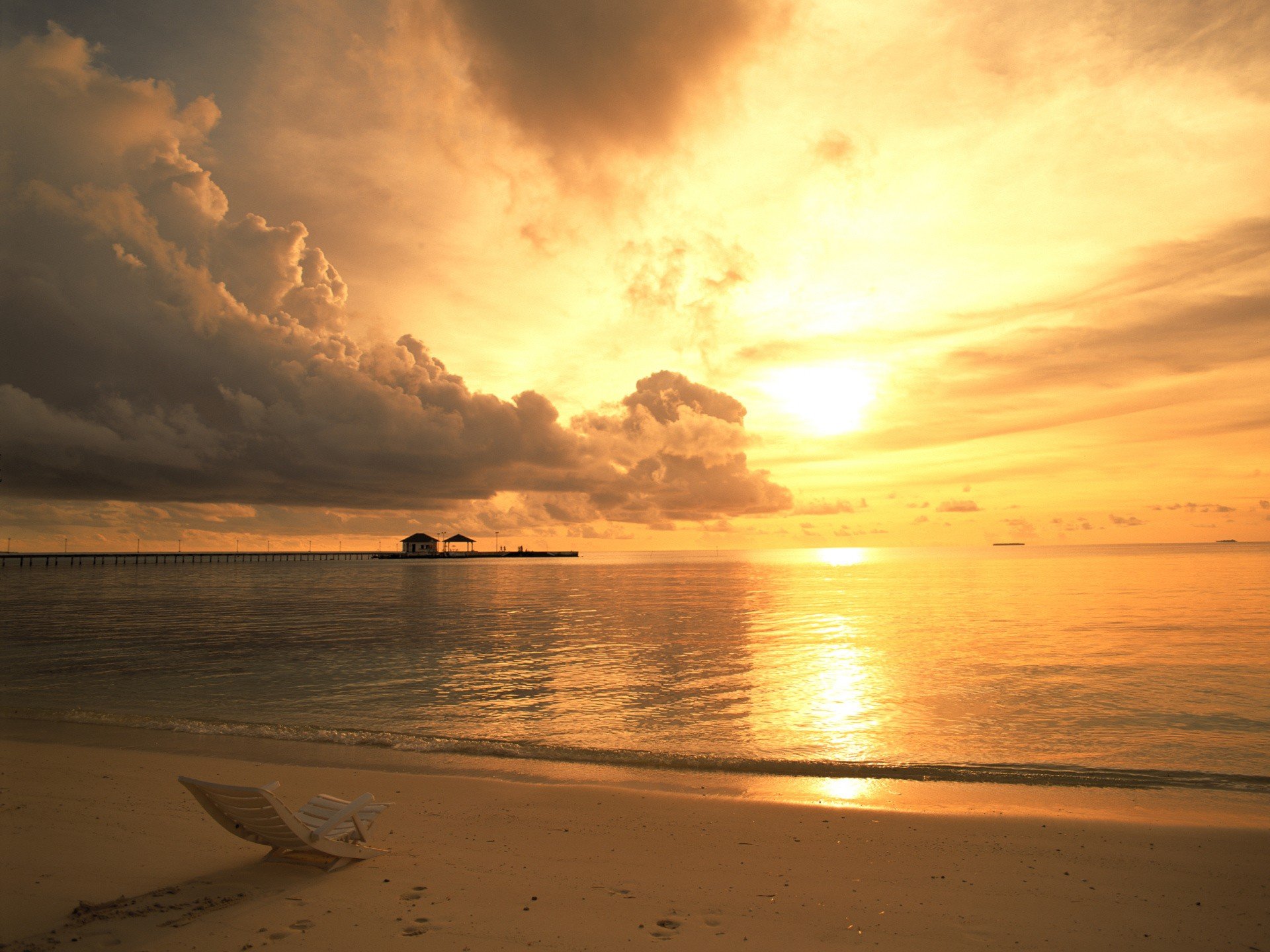 chaise sunset sea cloud