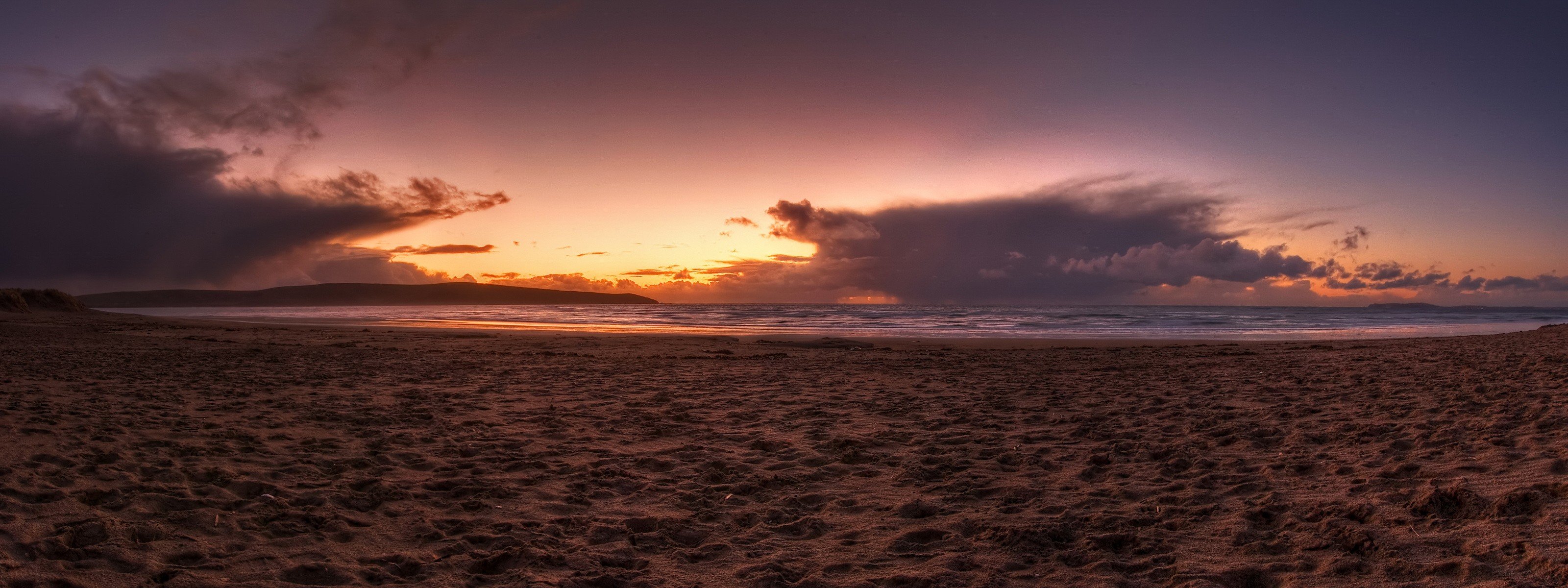 tramonto spiaggia sabbia mare