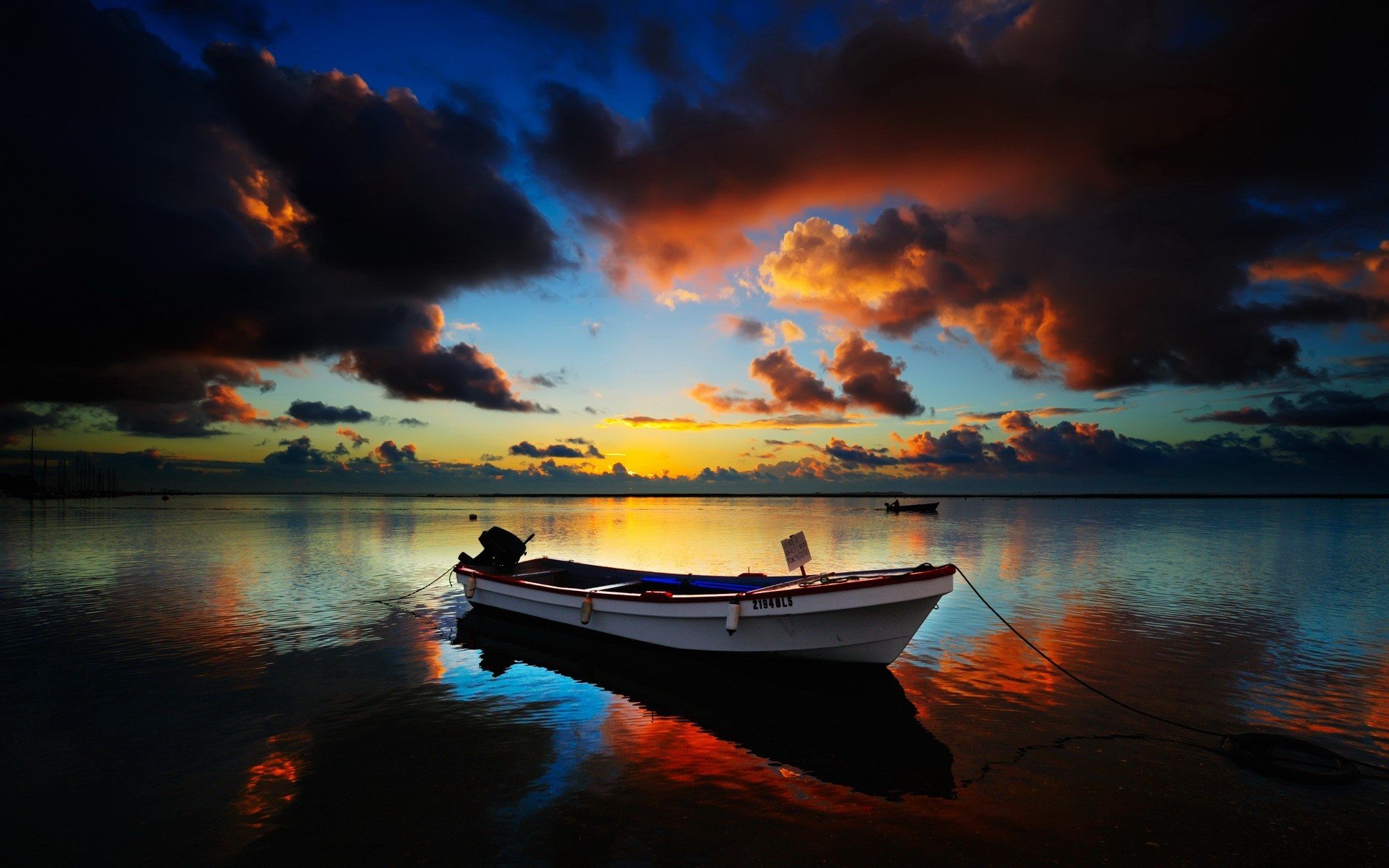 boat horizon clouds night