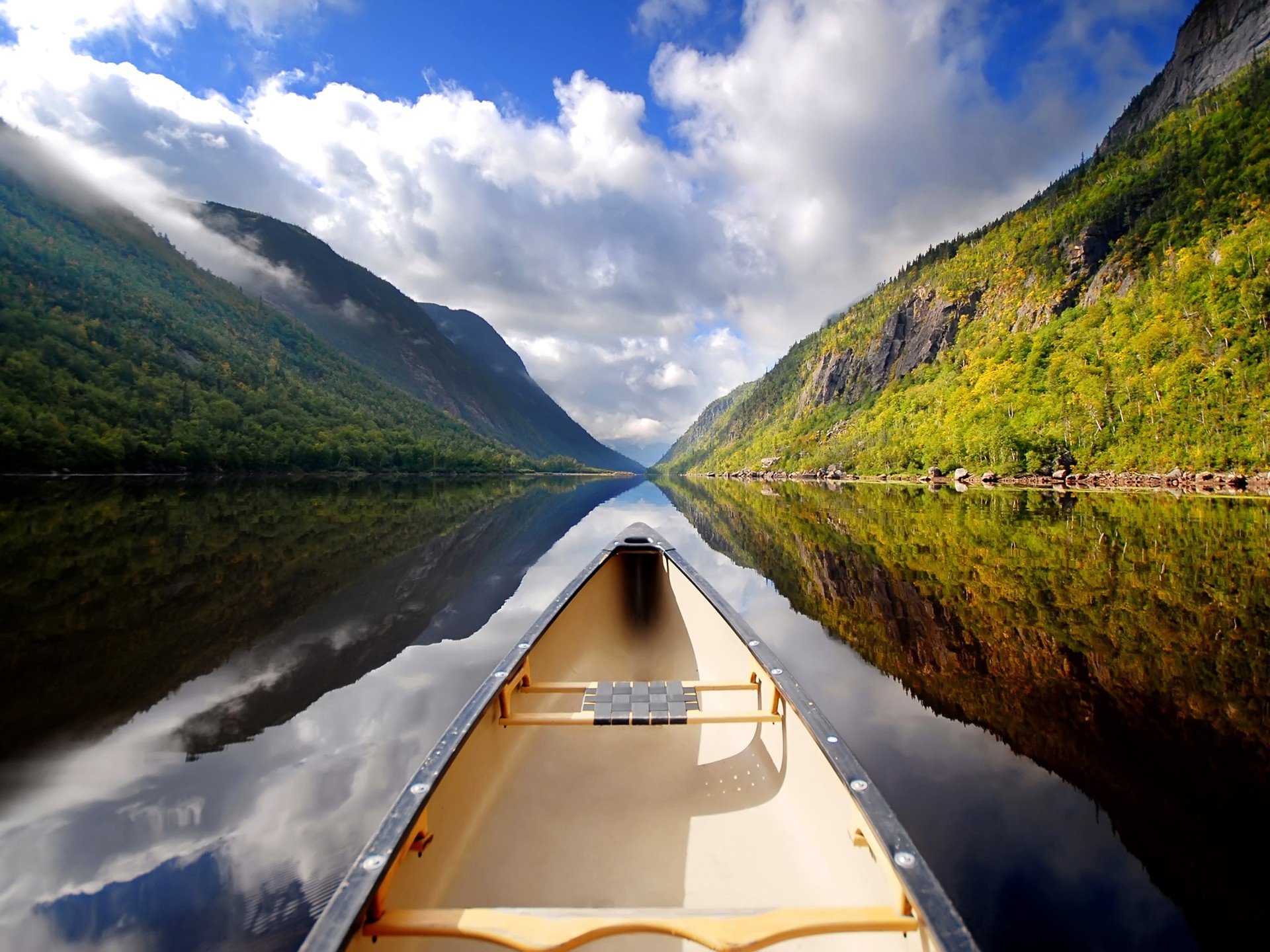 boat mountain sky