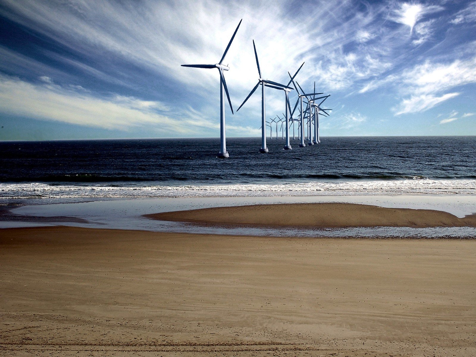 beach sea a windmill