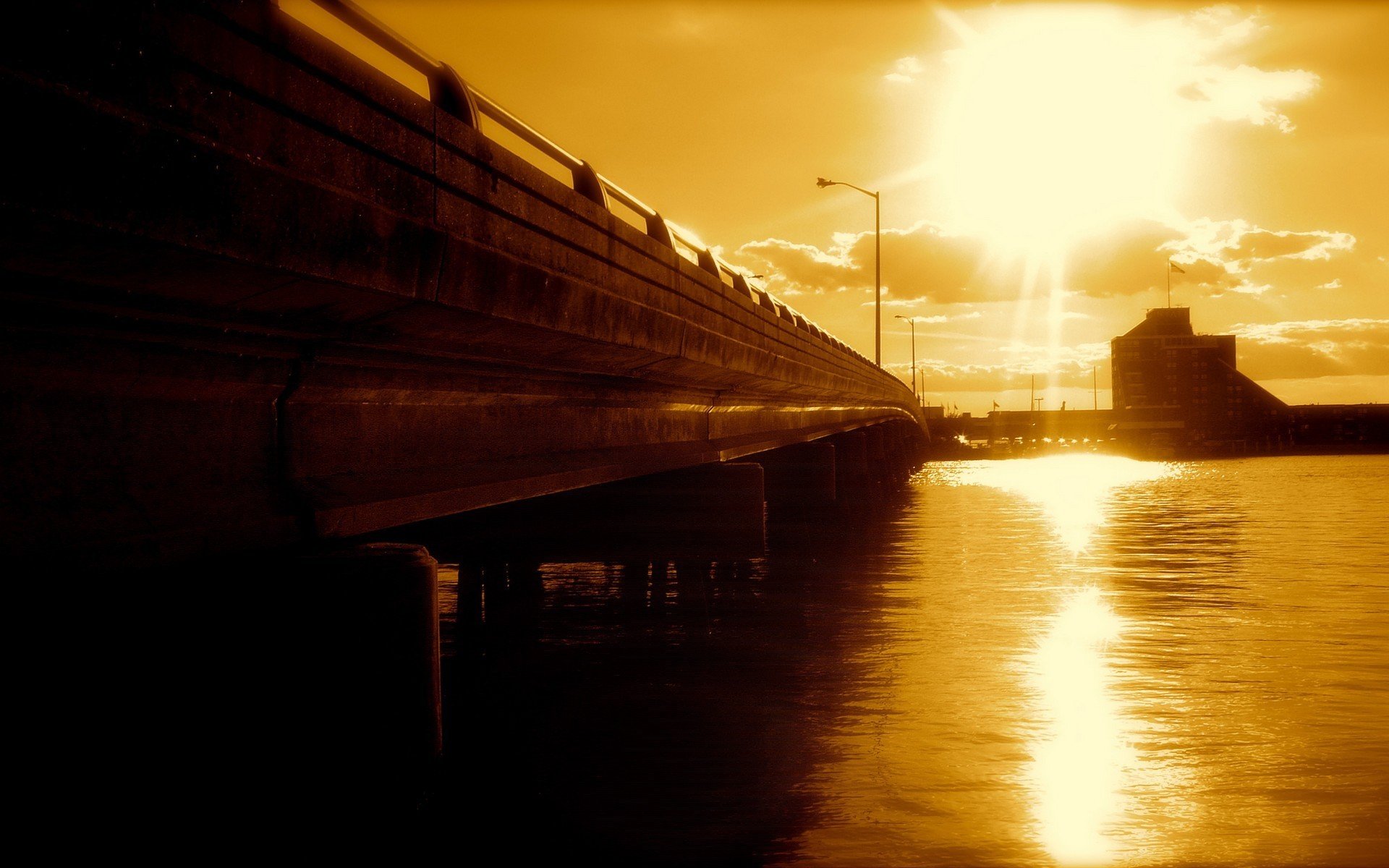 puente puesta de sol agua