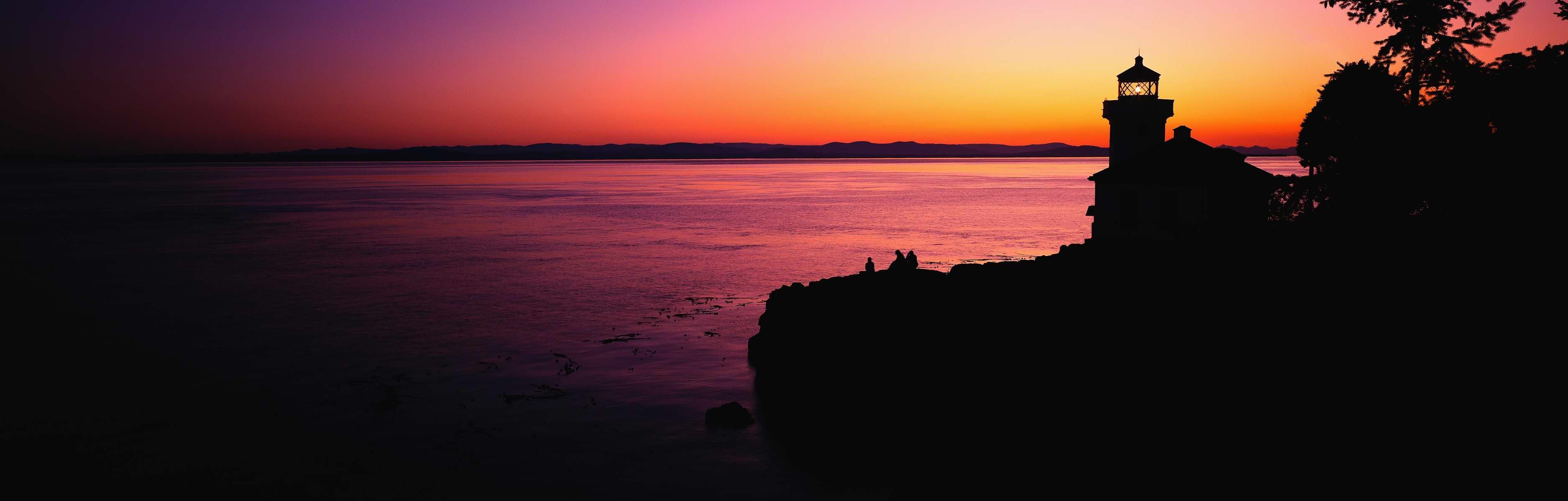 faro tramonto mare