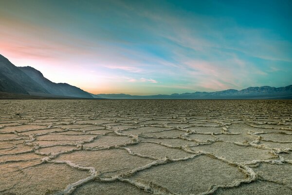 Drought in the desert, light clouds