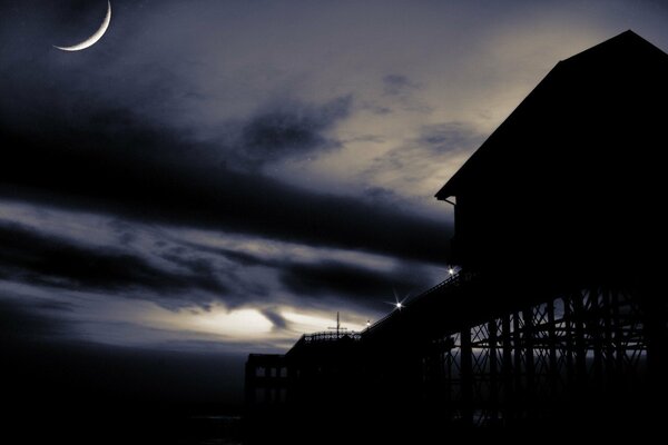 Beautiful moon over the pier