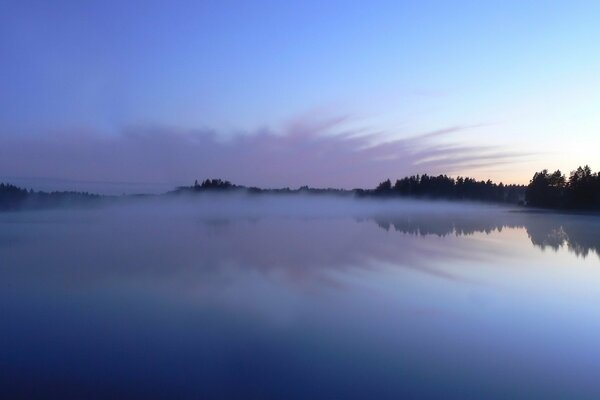 Fog over the lake at dawn