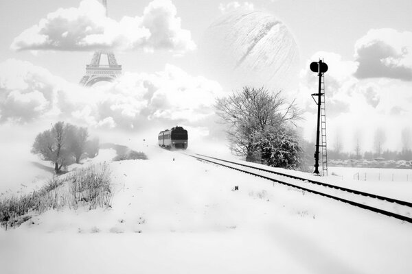 Szary śnieżny pociąg jedzie do Paryża