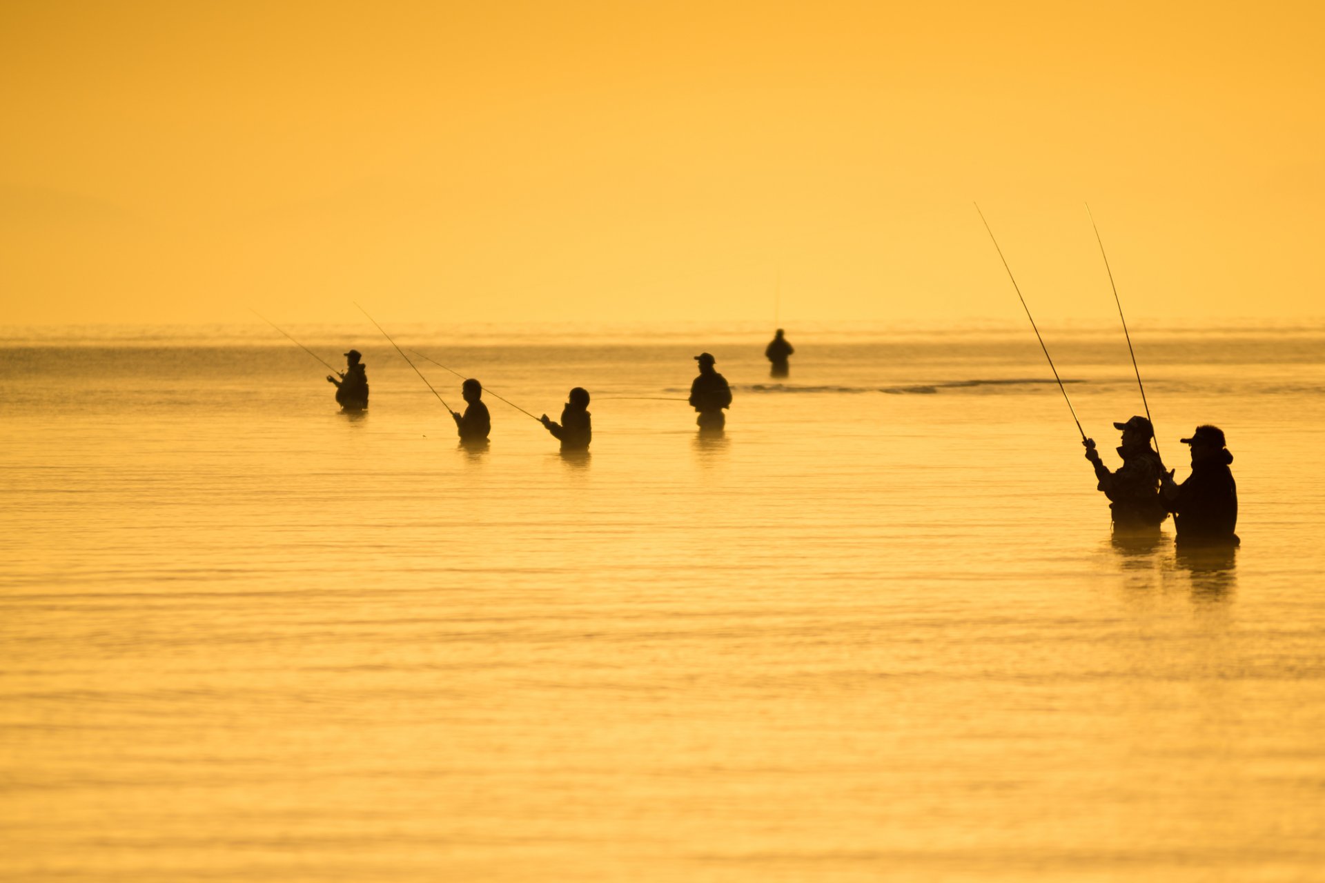 mare persone pesca