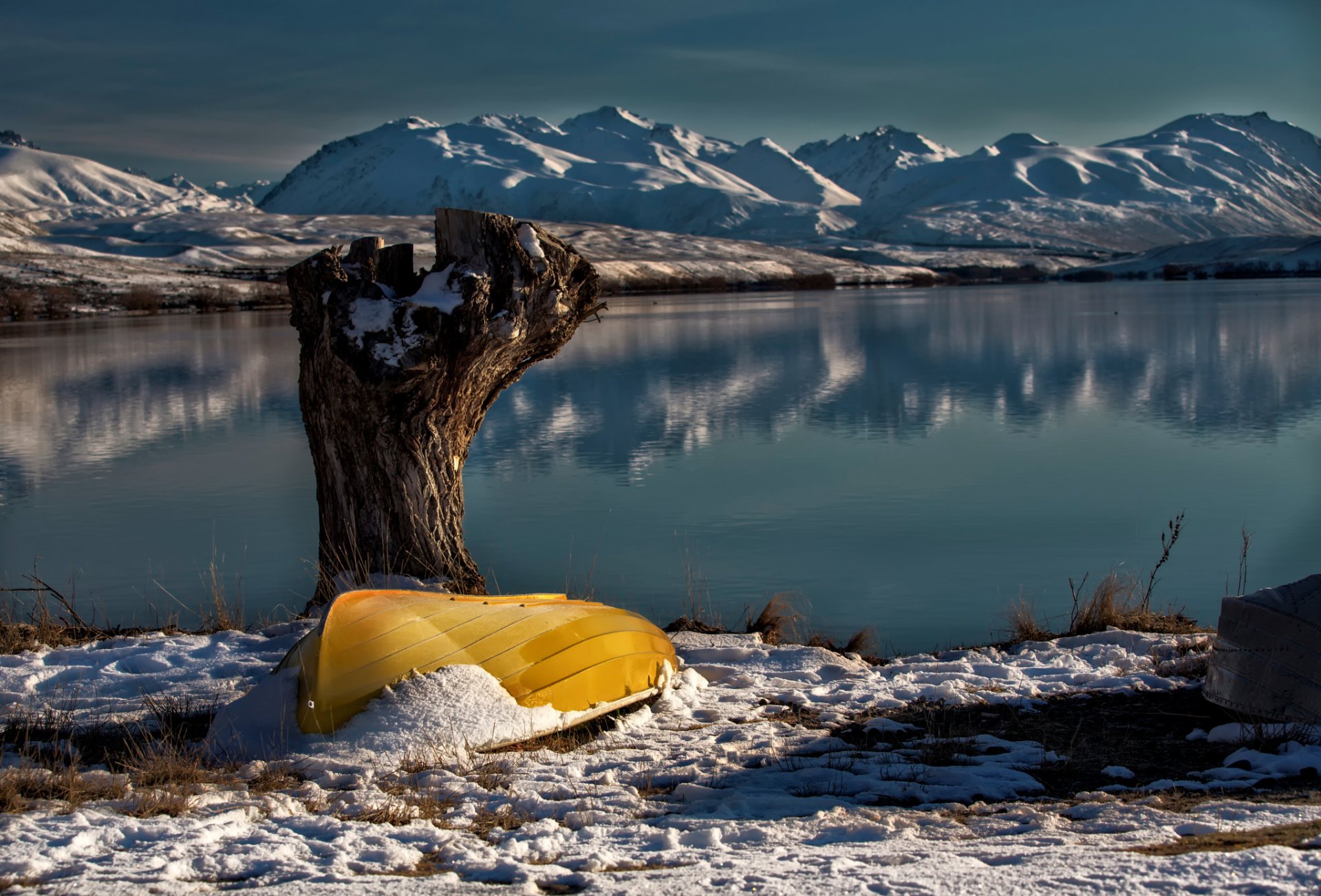 lake alexandrina lake tekapo south island new zealand lake snow boat