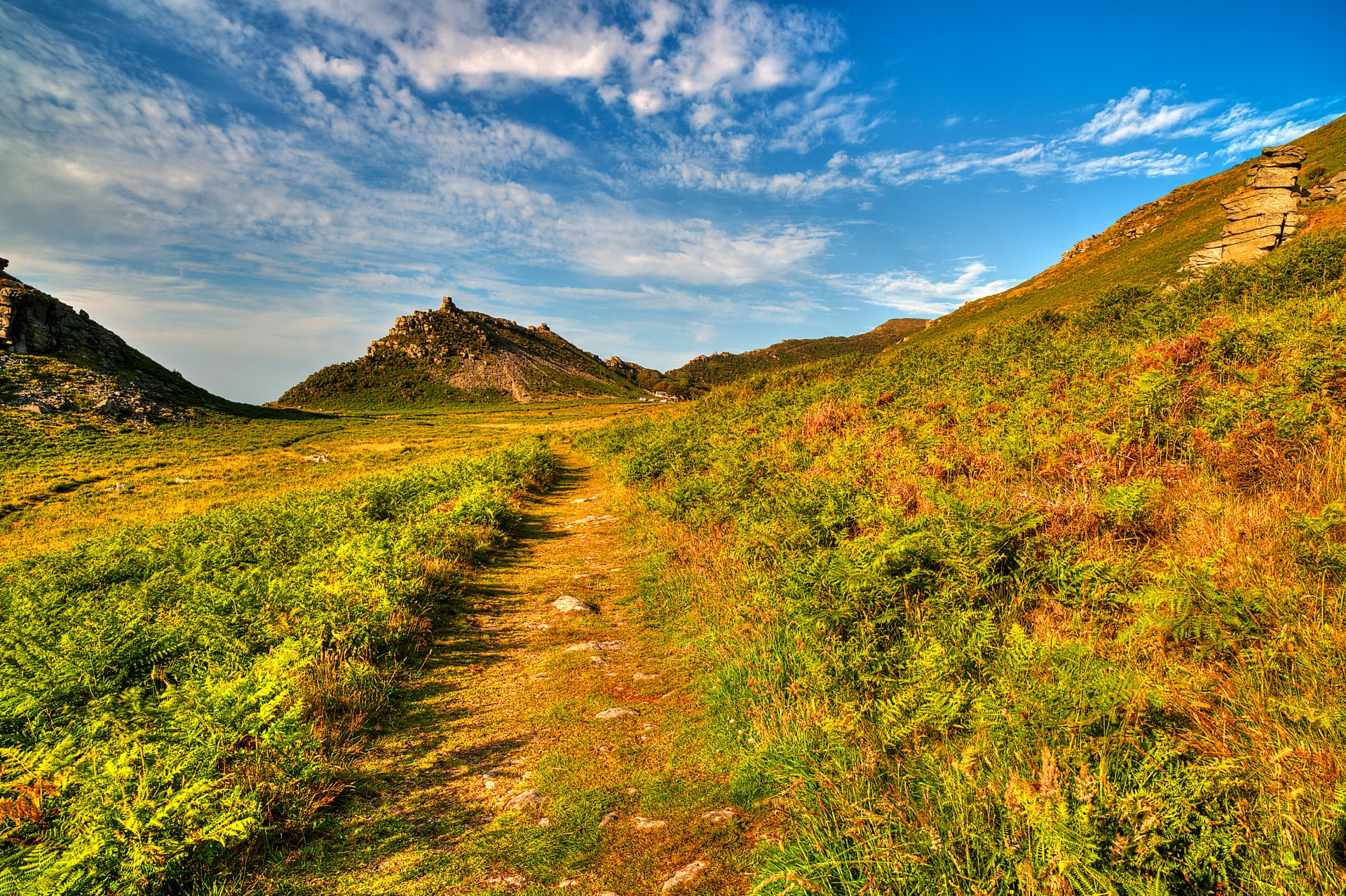 gb exmoor sky clouds rock grass mountain road path