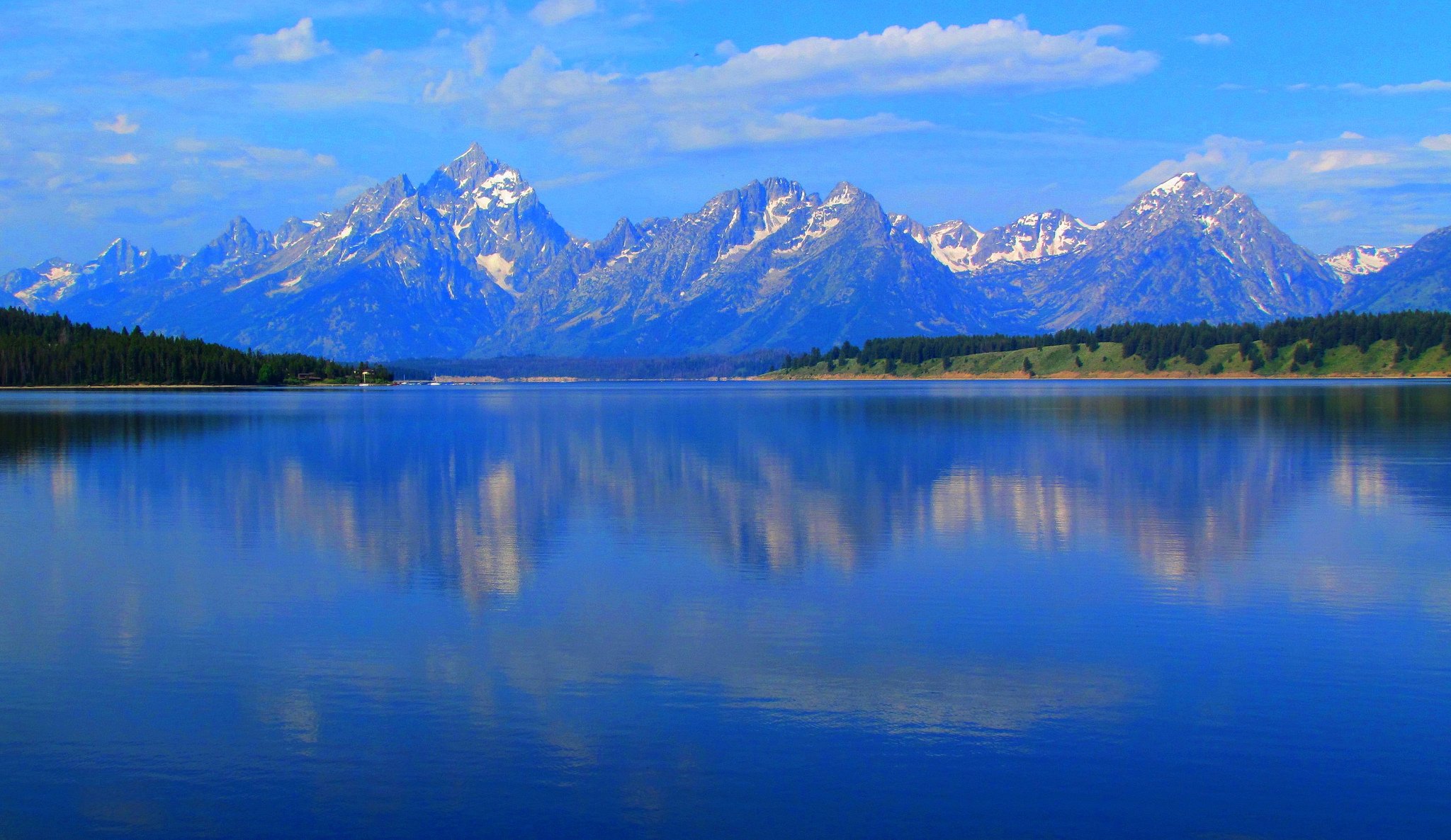 parc national du grand teton wyoming usa montagnes lac arbres forêt ciel nuages