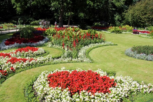 Germany lawns in the park with flower beds and flowers