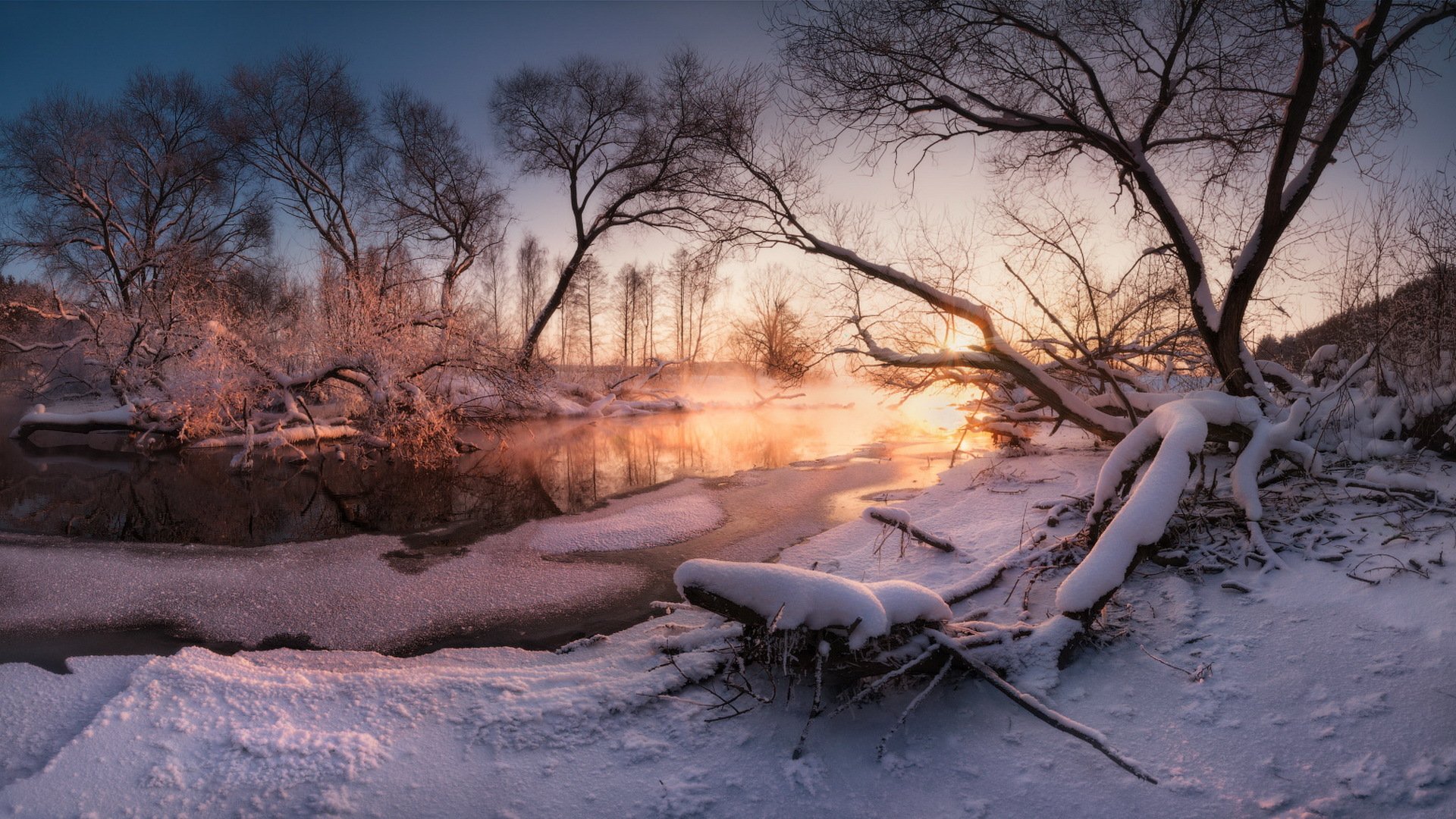 fiume inverno tramonto