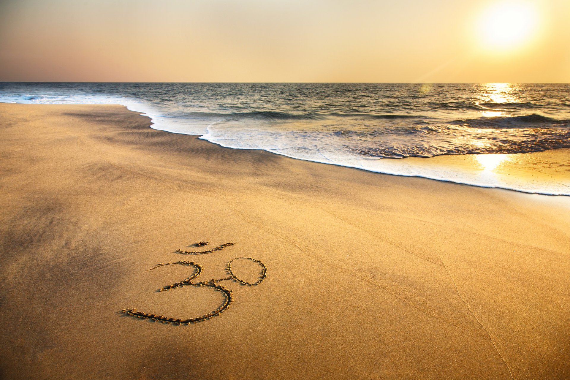 symbol om piasek brahma ocean plaża morze zachód słońca brzeg