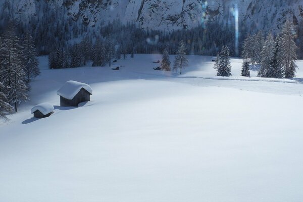 Winter landscape with a house in the mountains