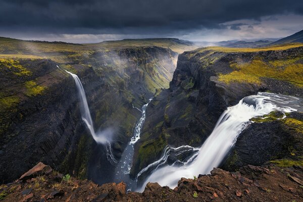 Waterfall in Iceland in the gorge of the river